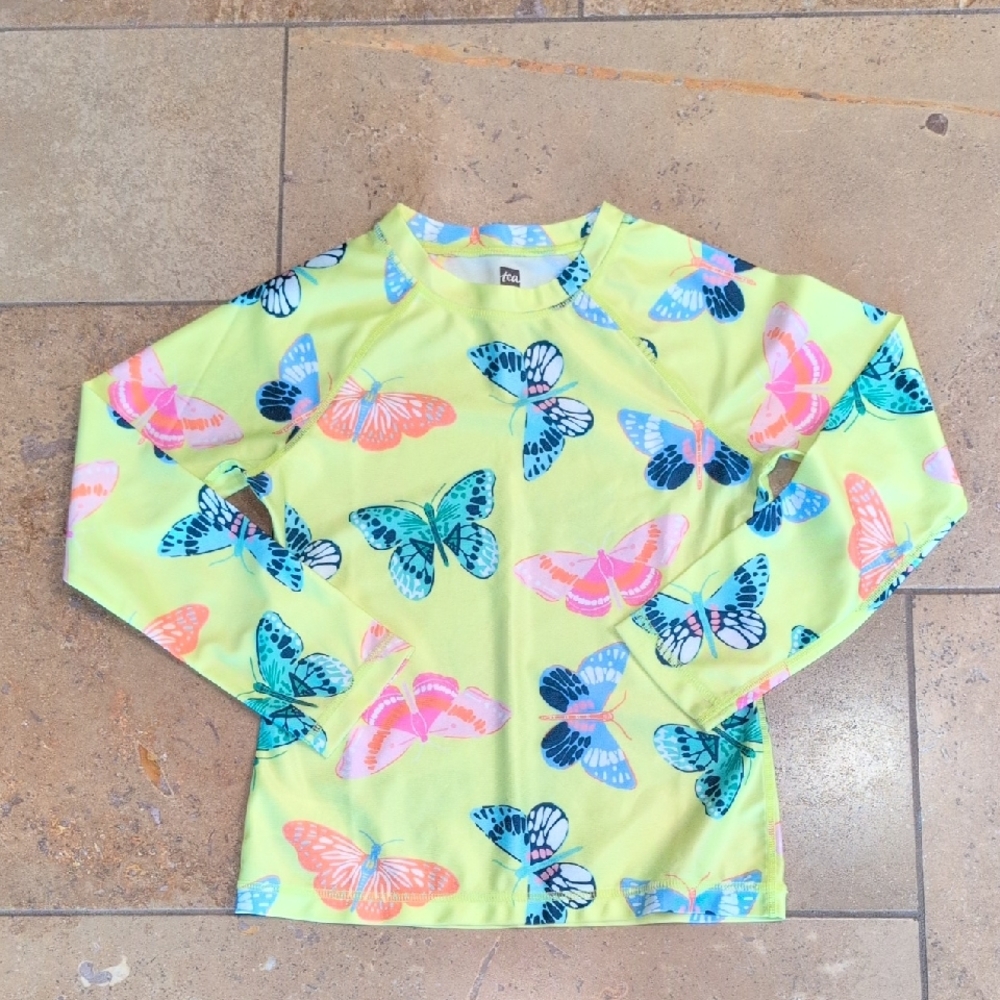 Tea Collection girl long sleeve rash guard shirt. Yellow butterfly print. Size 8